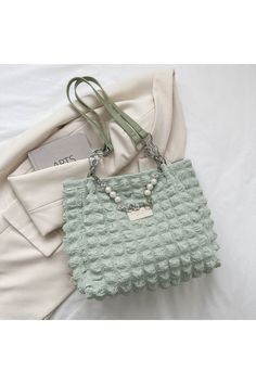 Bubble Textured Tote Bag 
Bag size: Medium Material: Polyester Imported Product measurements: Length 11.8 in, Width 5.1 in, Height 10.8 in, Weight 9.9 oz
https://fitggins.com/products/bubble-textured-tote-bag 
FITGGINS
 #fitgginsfashion #trendywomen #onlinefashionstore #latesttrends #hotteststyles #womensclothing #fashionforward #shopnow #stylishwomen #fashionista #trendalert #shopfitggins #fashionfinds #musthaves #fashiongoals Blue Zones, Mobile Phone Bag, Judy Blue Jeans, Functional Accessories, Bag Light, Phone Bag, Color Matching, Light Green, Bags Handbags