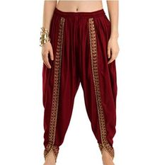 Dhoti pants Indian style bottoms. Nice color with embroidery and beaded border. Unique style. Pair this Indian dhoti pants with crop top. These loose fitted bottoms are in trend right now. Size Waist is elastic from 26 inches stretchable up to 34 inches Length approximately 35 inches Please inform us if this is needed by specific date so we can guide you if it is possible. NOTE: These may be slight color difference due to screen settings. Bollywood Style Festive Bottoms With Traditional Drape, Bollywood Style Festive Bottoms For Eid, Festive Bollywood Bottoms For Eid, Bollywood Style Festive Bottoms For Navratri, Bollywood Style Harem Pants For Festivals, Bollywood Style Embroidered Festive Bottoms, Traditional Harem Pants With Festive Drape, Traditional Fitted Harem Pants, Festive Bollywood Embroidered Bottoms