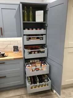 an open pantry with lots of food in it