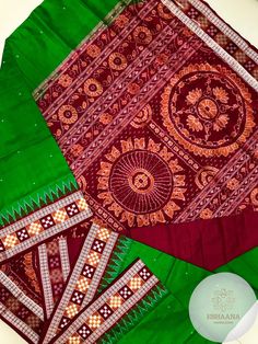 green and red saree with intricate designs on the palan silks, which are handwovened in india