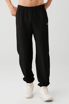 We’re all about the Accolade Sweatpant — it’s a super soft, leveled-up classic with a chrome Alo logo detail and powerful, performance tech for studio & street. Wear it in cold weather with a bold jacket and transition to warmer weather with slides. Super-soft diagonal French terry For chill time or to-and-from Unisex style Designed to work from studio to street Wear-tested by our in-house team for the perfect fit Comfortable Cotton Bottoms By Alo Yoga, Comfortable Cotton Alo Yoga Bottoms, Comfortable Alo Yoga Cotton Bottoms, Casual Alo Yoga Bottoms, Black Joggers With Ribbed Waistband For Fall, Fall Black Joggers With Ribbed Waistband, Black Sweats With Comfort Waistband For Loungewear, Black Comfort Waistband Sweats For Loungewear, Baggy Casual Activewear For Loungewear