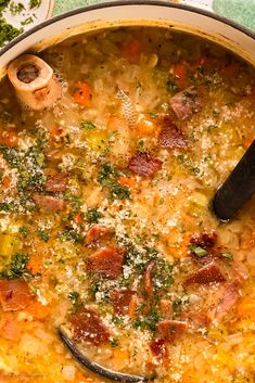 a large pot filled with soup on top of a table