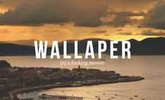 an aerial view of a harbor with boats in the water and clouds above it that reads wallpaper