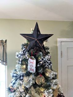 a decorated christmas tree with a star on top