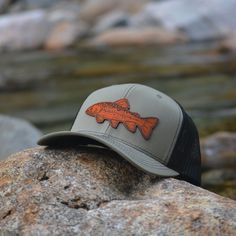 Custom Brook Trout Leather Patch Hat. This trucker style hat is perfect to add your personalized touch to. Choose from our variety of hat color and leather color options. Fish patch engraved into our high quality leather patch hat. PRODUCT DETAILS -------------------------- ~ Richardson 112 trucker style snapback hats ~ Brook Trout on our high quality 100% genuine leather patch hats ~ Hat Color Options: Black, Navy, Heather Gray / Black, Charcoal / White, Navy / White, Charcoal / Black, Black / Brown Curved Brim Trucker Hat For Fishing, Adjustable Trucker Hat For Fishing, Brown Snapback Trucker Hat For Fishing, Casual Brown Trucker Hat For Fishing, Curved Brim Trucker Hat For Fishing, Brown Snapback Fishing Hat, Brown Snapback Hat For Fishing, Trucker Baseball Cap For Fishing, Brown Fishing Cap