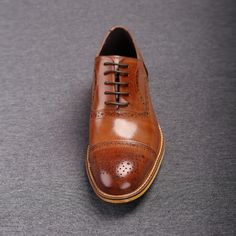 Brown Oxford shoes are life-savers of a sort because they can be worn with almost anything! Since these are high-quality ones, you can rest assured they will go equally well with jeans and tweed. This pair will be a great addition to any unique shoe collection. These oxfords can be worn with 2- and 3-piece business suits and casual suits, whatever suits your taste! Suits with bold patterns and material blends will also be perfect with these shoes. No matter which color suit you are wearing, these shoes go along with every shade. Be it grey, dark brown, or navy colored suits. In fact, many style experts prefer them over wearing black due to their far more visually striking effect. The shoes are constructed from 100% Genuine Leather for maximum durability The only premium quality leather is Classic Wingtip Lace-up Shoes For Fall, Classic Round Toe Dress Shoes For Fall, Fall Wingtip Lace-up Shoes With Leather Sole, Leather Wingtip Lace-up Shoes For Fall, Fall Wingtip Leather Shoes With Brogue Detailing, Fall Business Leather Shoes With Brogue Detailing, Leather Cap Toe Oxfords For Fall, Business Wingtip Oxfords For Fall, Fall Semi-formal Goodyear Welted Oxfords