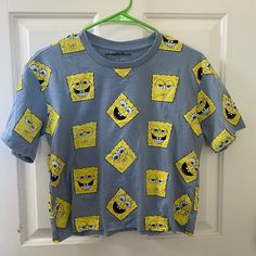 Never Worn Spongebob T Shirt In A Size Small. No Issues! Spongebob Crop Top, Blue Fun Top With Funny Print, Blue Tops With Funny Print, Trendy Blue Cartoon Print Shirt, Fun Blue Crew Neck Top, Blue Crew Neck Fun Tops, Blue Crew Neck Top With Fun Style, Spongebob T Shirt, Mr Krabs