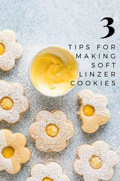 cookies with powdered sugar and butter in the middle on a blue surface, with text overlay that reads 3 tips for making soft linzer cookies