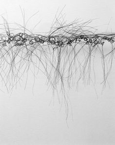 an abstract drawing of lines and branches on a white background with water droplets in the foreground