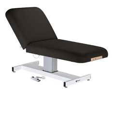 The Everest™ is a minimalist massage table that offers spa-level functionality and comfort. It's an ideal choice for day spas, medi-spas, and resorts. The table features a sleek single pedestal design that maximizes leg and knee room, giving therapists easy access to clients while maintaining exceptional strength and stability. Sleek Single Pedestal Design The reliable electric lift actuator provides smooth height adjustments with an easy to use foot pedal CE approved Heavy duty steel frame prov Beauty Office, Day Spas, Lift Table, Massage Tables, Massage Table, Towel Warmer, Salon Furniture, Office Essentials, Furniture Collections