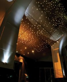 the ceiling is decorated with stars and lights