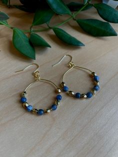 Gold hoops with semi precious blue beads & gold beads. Great for sensitive ears & lightweight! Blue Teardrop Hoop Earrings With Dangling Beads, Blue Small Hoop Beaded Earrings With Dangling Beads, Blue Nickel-free Hoop Earrings For Everyday, Blue Hoop Earrings With Dangling Beads Gift, Blue Beaded Earrings For Everyday, Blue Beaded Drop Earrings For Everyday, Blue Jewelry With Gold Beads, Adjustable Blue Hoop Earrings With Dangling Beads, Everyday Blue Beaded Drop Earrings