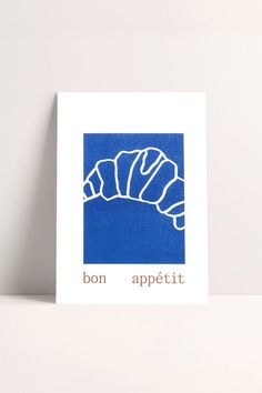 a card with the words bon appetit on it