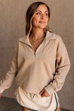 Karla Quarter Zip-Up Long Sleeve Sweatshirt - cream- top view Beige Top With Ribbed Collar For Fall, Half-zip Sweater For Fall Loungewear, Fall Half-zip Loungewear Sweater, Fall Half-zip Sweater For Loungewear, Sporty Beige Sweater With Ribbed Cuffs, Beige Tops With Ribbed Cuffs For Fall, Fall Everyday Tops With Ribbed Collar, Fall Tops With Ribbed Collar For Everyday, Cozy Fit Half-zip Top With Ribbed Cuffs