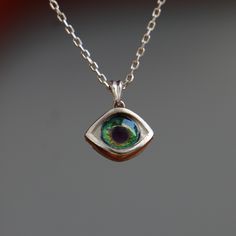 Minimalist Eye Necklace, Little Cute Eye Pendant, Green Tiny Eye Necklace, Personalized Design Necklaces, 925K Silver Pendant, Gift Idea My eye designs can be made specifically for your eyes, you need to take a beautiful iris photo for us. Then we can customize it for you. You can also add or remove blood details to our eye designs. You can write this in the order notes. Please send me a message after ordering. I can do as you wish. A quasi-universal symbol of protection, the evil eye is referre Everyday Sterling Silver Hallmarked Necklace, Handmade Sterling Silver Necklaces Fine Jewelry, Unique Everyday Sterling Silver Necklaces, Unique Sterling Silver Necklaces For Everyday, Handmade Sterling Silver Fine Jewelry Necklaces, Unique Sterling Silver Necklace For Everyday, Custom Fine Jewelry Sterling Silver Pendant Necklace, Custom Sterling Silver Pendant Necklace, Unique Sterling Silver Necklaces For Formal Occasions