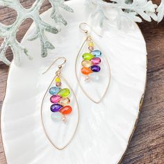 Colorful and happy statement elegant hoops with stunning Kaleidoscope of gems centered in a Marquee shape hoop. Length: 2″ May we recommend a great pairing with any of our favorite Zina Necklace https://annabalkan.com/products/zinas-classic-gemstone-necklace-1 Chocolate Jewelry, Hoops Earrings, Silver Hoop Earrings, Gemstone Necklace, Sterling Silver Jewelry, Gold Earrings, Gold Filled, Silver Earrings, Silver Jewelry