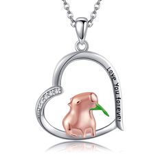 PRICES MAY VARY. Adorable Design：The 925 sterling silver capybara necklace features a lovable capybara munching on grass within a heart-shaped pendant. The capybara is adorned in rose gold, enhancing its charm. This design symbolizes innocence and brings a touch of playfulness. Capybara Jewelry Size: Capybara pendant:23.1mm * 20.2mm(0.91in * 0.79in) Chain length: 18+2in extension chain.Exquisite packaging suitable for gifts. High-Quality Material: Nickel-free,lead-free hypoallergenic 925 sterlin Capybara Jewelry, Capybara Eating, Funny Jewelry, Planet Necklace, Animal Necklace, Sterling Necklaces, Necklace Heart, Heart Shape Pendant, Pet Necklace