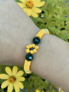 Bracelet made from three different types of beads. Sunflower Bead Bracelet, Adjustable Yellow Sunflower Design Jewelry, Sunflower Charm Bracelet, Different Types Of Beads, Cheap Yellow Flower-shaped Beaded Bracelets, Beaded Sunflower, Sunflower Jewelry Inspire Uplift ⭐, Types Of Beads, Sunflower Bracelet