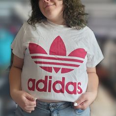 This Adidas Tee Is Perfect For A More Sporty Look, Or Something A Little Streetwear. Worn Maybe Once, It's In Practically Brand New Condition. Would Be Great For Anyone, And Looks Super Cute Styled Multiple Ways. Not Cropped, Just Styled That Way For Photos. Trendy Adidas T-shirt With Letter Print, Adidas Logo Summer Top, Summer Adidas Logo Top, White Adidas Tops For Spring, Basic Red Top With Letter Print, Basic Adidas Logo Crew Neck Tops, Basic Adidas Crew Neck Tops, Adidas Red Crew Neck T-shirt, Red Adidas Crew Neck T-shirt