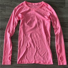 Like New Lululemon Run Swiftly Tech Long Sleeve Pink Size 4 Condition: Like New - Excellent (Worn Only Once. No Signs Of Wear. No Snags, No Stains, No Pilling - Looks Brand New!) Color: Pink Size: 4 Pink Sporty Activewear With Thumbholes, Pink Workout Tops With Thumbholes, Pink Long Sleeve Training Tops, Pink Long Sleeve Training Activewear, Pink Long Sleeve Activewear For Training, Pink Activewear With Thumbholes For Sports, Functional Long Sleeve Pink Tops, Pink Long Sleeve Activewear For Light Exercise, Pink Long Sleeve Activewear For Workout