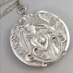 Goddess Freya Locket Necklace. A Mucha Style Design. Large Oval Silver Vintage Style Locket With A Lovely Mucha Goddess Girl Added To The Front Of The Locket. The Locket Is 1.5 Inches In Diameter. The 24 Inch Silver Plated Chain Included With Toggle Clasp. All Lockets Are Brass With Silver Plating. Freya Goddess, Antique Locket, Goddess Necklace, Silver Locket, Silver Lockets, Greek Goddess, Locket Necklace, Turquoise Jewelry, Stone Jewelry