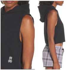 With A Cropped Hem And Easy Shape, This Sleeveless Cotton-Jersey Hoodie Will Lock Down Your Athleisure Style. - Attached Hood - Sleeveless - Knit Construction - Imported Fiber Content 57% Cotton, 38% Polyester, 5% Spandex Care Machine Wash Sporty Sleeveless Top For Loungewear, Black Sleeveless Loungewear Top, Casual Hooded Tank Top For Sports, Black Cotton Tank Top For Loungewear, Sporty Black Tank Top For Loungewear, Edgy Spring Workout Tops, Edgy Workout Tops For Spring, Black Cotton Sportswear Tank Top, Black Cotton Tank Top Sportswear