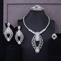 Elegant White Bridal Sets For Party, White Cubic Zirconia Bridal Sets For Party, White Cubic Zirconia Jewelry Sets For Party, White Hand Set Bridal Earrings For Party, Hand Set White Bridal Earrings For Party, Silver Bridal Sets For Party, Silver Bridal Earrings For Party, White Hand Set Jewelry For Party, Silver Hand-set Bridal Earrings For Party