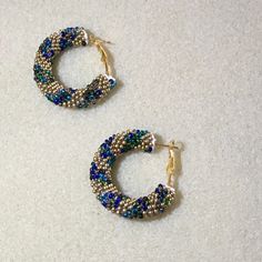 Beautiful Handmade Beaded Hoop Earrings, Gold, Teal, Greens - Mermaids On The Sand Colors 1.5” Diameter Blue Beaded Round Hoop Earrings, Blue Beaded Small Hoop Jewelry, Blue Beaded Small Hoop Earrings, Small Blue Beaded Hoop Earrings, Blue Hoop Earrings For Party, Colorful Beaded Hoop Earrings For Party, Small Hoop Earrings With Colorful Beads In Blue, Blue Hoop Jewelry With Colorful Beads, Blue Hoop Earrings With Colorful Beads