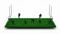 the silhouettes of football players are on an artificial field