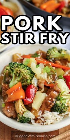 pork stir fry with broccoli, carrots and peppers in a white bowl