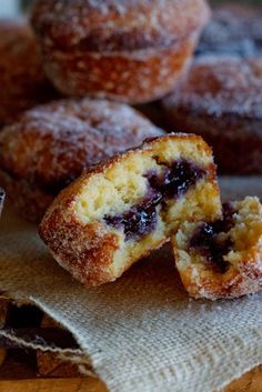 blueberry muffins cut in half on a table