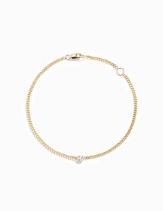 This solid 14k bracelet has a prong-set 3mm diamond on a flat curb chain with a lobster clasp closure. Measurements: Chain Width: 1.8mm Carat Weight: 0.10 Small - 6" with a loop at 5" Medium - 7" with a loop at 6" Large - 8" with a loop at 7" Diamond Chain Bracelet, Happy To Meet You, Nyc Studio, Diamond Chain, Curb Chain, Chain Bracelet, 3 Weeks, Prong Setting, Lobster Clasp