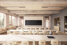 an empty classroom with desks and chairs