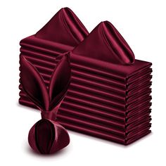 a stack of red napkins sitting on top of each other