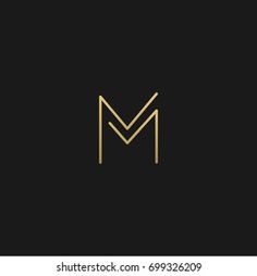 the letter m is made up of thin lines and has a black background with gold accents