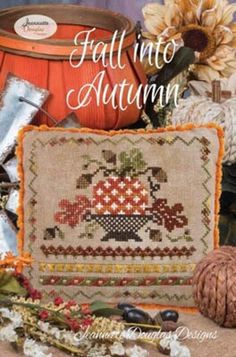 the fall into autumn cross stitch pattern is shown