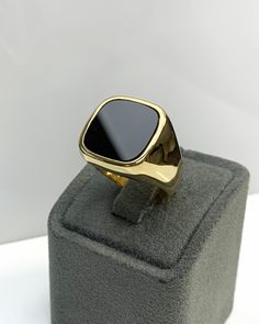 Men Ring with Onyx, Black Pinky Signet Ring, Square Shape Genuine Gemstone, Stylish Gold Ring, Handmade Jewelry, Best Gift for Him ◎ Details ◎ ○ Material 14K Solid Gold Weight of Ring : approx 18.00 gr Height of Ring : approx 5.30 mm ○ Gemstone Natural Onyx Gemstone approx. 15 mm x 15 mm 4.23 ct Made to Order HANDMADE ITEM ○ For Men Collection : https://etsy.me/2PmKJMW All of our jewelleries are designed, created and manufactured in our shop/atelier. Since the products are handmade, their dimens Modern Black Enamel Rings For Gifts, Gold Onyx Rings With Polished Finish, Polished Open Ring Jewelry For Gifts, Gift Jewelry With Polished Edges Open Ring, Modern Onyx Ring Gift, Black Rings With Polished Edges For Gifts, Elegant Onyx Signet Ring As Gift, Luxury Rings With Polished Edges As Gift, Black Enamel Ring Jewelry