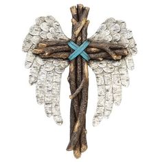 a cross made out of wood with wings on it