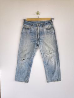 Vintage Levis 510 Light Washed Jeans Diatress Denim Pants - BS45923.  Manual Measurement (Laying Flat):  1) Waist: 34 inch.  2) Rise: 12 inch.  3) Hip: 21 inch.  4) Tight: 11.5 inch.  5) Outseam: 37 Inch.  6) Inseam: 25.5 Inch.  7) Leg Opening: 8.5 inch.  Please check measurements to insure a proper fit. Remember to allow yourself some extra room for movement.  You can compare these with something from your closet that fits you well. Condition: Good Vintage Condition.  Made in USA.  Fabric Material: 100% Cotton.  BS45923.  We do combine shipping.  Please Read Before Purchase. Drop your phone number. Tracking number can be tracked 3 - 5 days after shipment process. Please be patient waiting. This design and style by wearing it increases your confidence. All pieces are measured inches while Retro Cutoff Light Wash Jeans, Retro Light Wash Cutoff Jeans, 90s Style Distressed Faded Jeans, 90s Distressed Faded Jeans, Vintage Acid Wash Relaxed Fit Bottoms, Distressed Washed Blue 90s Bottoms, 90s Distressed Washed Blue Bottoms, Vintage Distressed Relaxed Fit Bottoms, Vintage Distressed Bottoms With Relaxed Fit