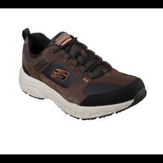 Men's Skechers Relaxed Fit Oak Canyon Walking Sneaker Relaxed Fit Design For A Roomy And Comfortable Fit Tough Synthetic Overlays At Toe And Heel Mesh Fabric Front And Side Panels For Cooling Effect Stabilizing Heel And Side Panels Padded Collar And Tongue Memory Foam Cushioned Comfort Insole Well-Cushioned Flexible Shock-Absorbing Midsole Stabilized Supportive Athletic Midsole Design Stabilized Midfoot Panel High-Traction Rubber Flexible Outsole Heel Pull Tab For Easy On And Off Rugged Brown Slip-resistant Walking Shoes, Rugged Brown Sneakers With Ortholite Insole, Brown Lace-up Walking Shoes With Cushioned Footbed, Brown Walking Shoes With Round Toe For Sports, Brown Round Toe Walking Shoes For Sports, Brown Fade-resistant Sneakers With Round Toe, Brown Streetwear Walking Shoes With Laces, Brown Synthetic Walking Shoes For Outdoor Activities, Rugged Brown Lace-up Walking Shoes