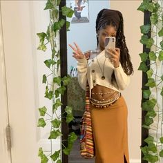 Headwrap on twist, long skirt, cardigan, colorful bag Spiritual Core Outfits, Long Skirts Outfit Black Women, Fairycore Outfit Black Women, Earthy Outfits For School, Kimono And Skirt Outfit, Long Skirt Outfits Black Women, Spiritual Aesthetic Fashion, Boho Black Women Aesthetic, Earthy Cardigan