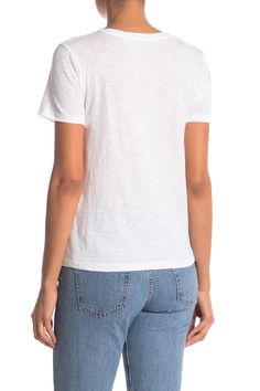 Pair this classic short sleeve V-neck tee with your favorite shorts or jeans for everyday style.Fit: this style fits true to size. V-neck. Short sleeves. Slips on over head. Solid color. Slub knit construction. Approx. 24" length (size M). Approx. 25.5" length (plus size 2XL). ImportedThis item cannot be shipped to Canada. White Cap Sleeve T-shirt, Relaxed Fit V-neck Graphic Tee, Casual White T-shirt With Cap Sleeves, Casual White Cap Sleeve Tops, Casual White V-neck Short Sleeve Top, White Relaxed Fit V-neck Short Sleeve Top, Fitted V-neck Graphic Tee, Casual Cotton Short Sleeve Top With Cap Sleeves, Basic V-neck Summer Shirt