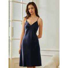 This dress is perfect as a nightdress, providing ultimate comfort for a peaceful night's sleep. Additionally, it can be worn as a discreet extra layer under clothing, adding an extra touch of coverage and comfort. Elegant V-neck Sleepwear For Relaxation, Elegant Nightgown For Lounging, Elegant V-neck Nightgown For Lounging, Elegant Summer Dresses For Relaxation, Elegant Solid Color Sleepwear, Elegant Blue Sleepwear For Lounging, Elegant Camisole Dresses For Bedtime, Elegant Summer Nightgown For Lounging, Elegant Blue Sleepwear For Relaxation