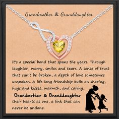 a necklace with an image of a woman holding a child's hand and the words grandmother and granddaughter on it