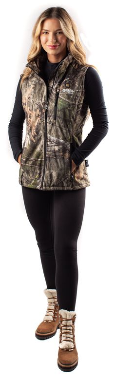 By combining lightweight, abrasion resistant polyester with conductive thread heating elements, our heated men's vest is your perfect solution for keeping warm on the go. The Colorado Heated Men's Vest provides up to 10 hours of electric warmth! Available in Officially Licensed Mossy Oak® Break-Up Infinity and Country DNA Camo, this vest has the ability to match any mood mother nature tosses at you. A low setting for those brisk days, medium for the cold ones and high for the bone chillingly "wh Conductive Thread, Hunting Vest, Mossy Oak Camo, Heated Gloves, Heated Jacket, Break Up, Camo Patterns, Mossy Oak, Men's Vest