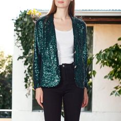 Introducing the Anna-Kaci Women's Long Sleeve Sparkle Sequin Two Button Blazer Jacket :a radiant and stylish choice that effortlessly combines glamour with sophistication. This dazzling blazer is adorned with sequins, providing a sparkling touch that sets it apart from the ordinary. The classic two-button design adds a timeless element to the jacket, making it a versatile piece for both special occasions and elevating your everyday ensemble. Step into the spotlight, exude confidence, and let you Fall Outerwear For Night Out With Buttons, Single Breasted Long Sleeve Party Outerwear, Long Sleeve Outerwear With Button Closure For Night Out, Trendy Single-breasted Outerwear For Party, Trendy Single Breasted Outerwear For Party, Single Breasted Outerwear For Winter Night Out, Spring Party Outerwear With Snap Buttons, Party Blazer With Double Button Closure, Chic Party Outerwear With Snap Buttons