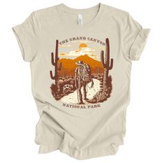 Original and Unique Design by Aperil Clothing. This Grand Canyon National Park shirt a perfect souvenir or gift for him or her. Perfect for hiking and camping or canoe. Cool vintage Graphic tee Discover the ultimate t-shirt collection that's out of this world, only at our one-of-a-kind store! Production time: 1-4 business days U.S.  Shipping time: 3-4 business days. For Sizing Guide Please Refer To Photos. This classic unisex jersey short sleeve tee fits like a well-loved favorite. Soft cotton a Pre-shrunk Short Sleeve Camp Shirt For Hiking, National Park Shirts, National Park Shirt, Hiking Shirt, Grand Canyon National Park, Hiking Shirts, Camping Hiking, Camping & Hiking, Fashion Tees