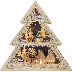 a wooden christmas tree with houses and trees on it's sides, lit up at night