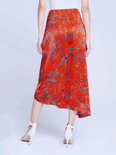 A gorgeous sarong-style midi skirt in pure silk detailed with a fire-red paisley print. Asymetrical sarong panels overlay a front underskirt and tie elegantly at side waist. Flattering smooth elastic waist and no closures. 100% Silk. Great Neck New York, Sarong Skirt, Turquoise Print, Red Fire, Unique Dresses, Sarong, Wrap Skirt, Skirt Top, Guest Dresses