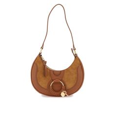 See By Chlo Hobo Bag Made Of Grained Leather And Suede And Embellished With Oversized Woven Leather Ring, Iconic Emblem And Key. Zipper Closure, Cotton-Lined Interior, Top Handle. Brass Hardware. Materal: 100% Capra Hircus 100% Cow Leather. Made In: India. Color: Brown. Collection: Fall - Winter 2023. Sku: Chs23asc17d87. Width: 22 Cm Height: 17 Cm Depth: 6 Cm Handle Drop: 27 Cm. Modecraze Is An Online Platform That Offers The Best Designer Products From Europe To Customers All Over The World. Ou Chloe Shoulder Bag, Chloe Brown, Leather Ring, Brown Leather Bag, Mini Shoulder Bag, See By Chloe, Pink Bag, Hobo Bag, Cow Leather